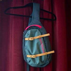 Patagonia 8L Atom Sling Bag with Pink and Yellow Accents